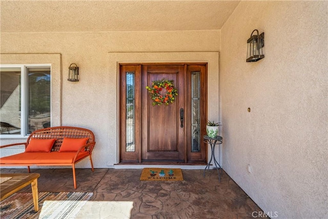 10204 Mount Olympus Valley Rd, Fallbrook, CA 92028 - view of exterior entry featuring stucco siding and a porch