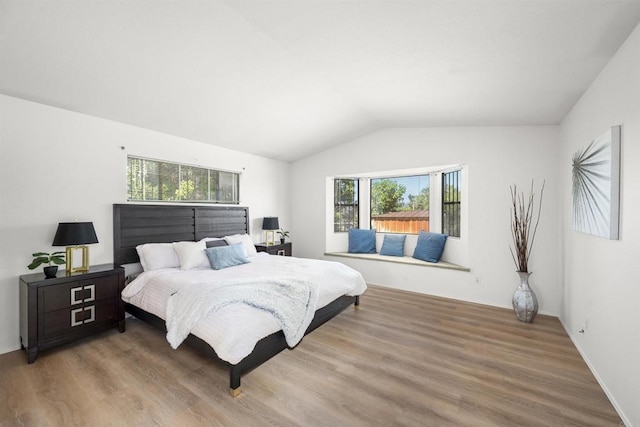 2125 Prospect St, National City, CA 91950 - bedroom featuring wood finished floors and vaulted ceiling