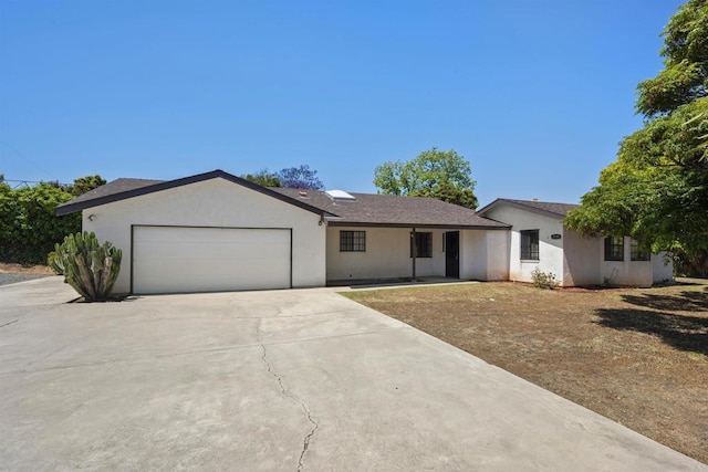 2125 Prospect St, National City, CA 91950 - ranch-style house with a garage, concrete driveway, and stucco siding