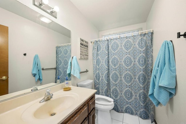 2125 Prospect St, National City, CA 91950 - bathroom featuring toilet, tile patterned floors, and vanity