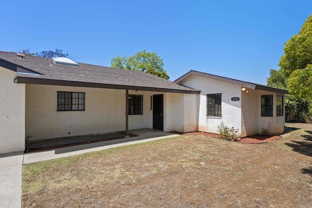 2125 Prospect St, National City, CA 91950 - view of front of property with stucco siding and a shingled roof