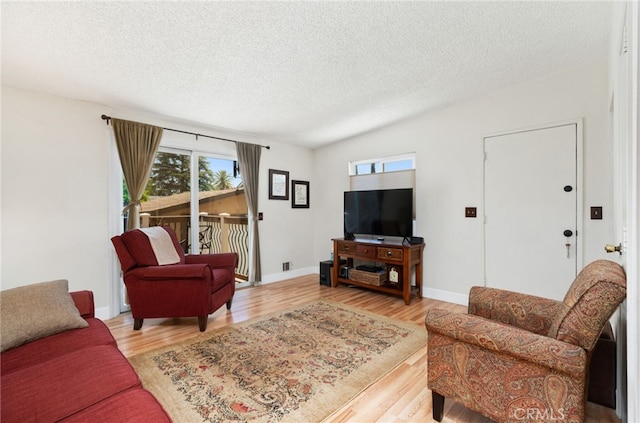 1260 Sinaloa Ave, Pasadena, CA 91104 - living room featuring a textured ceiling and wood finished floors