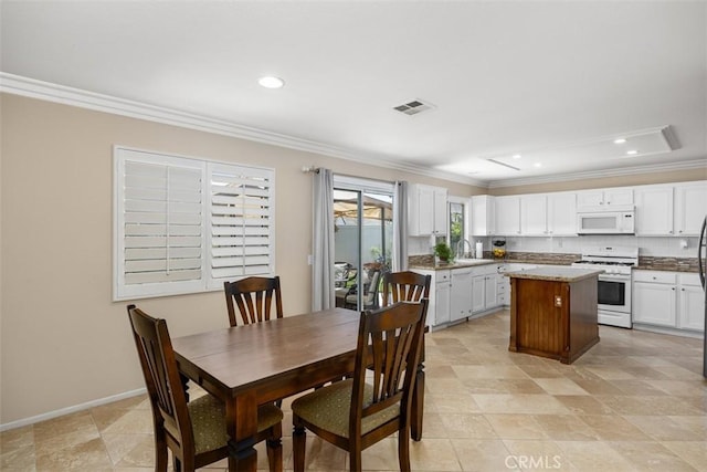 32295 Via Arias, Temecula, CA 92592 - dining room with ornamental molding, recessed lighting, and baseboards