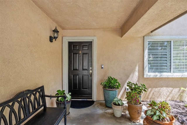 32295 Via Arias, Temecula, CA 92592 - property entrance with stucco siding