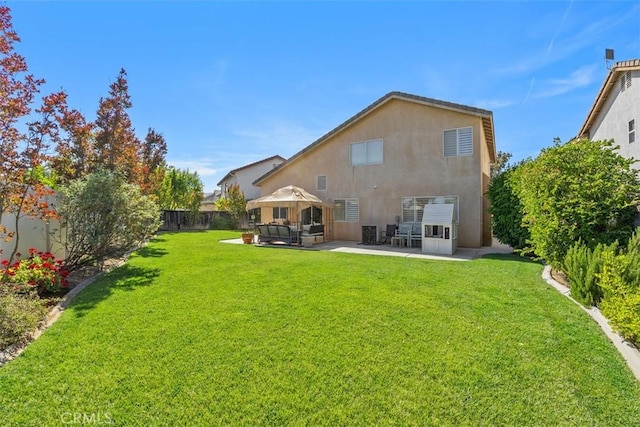 32295 Via Arias, Temecula, CA 92592 - back of property featuring stucco siding, a gazebo, and a patio