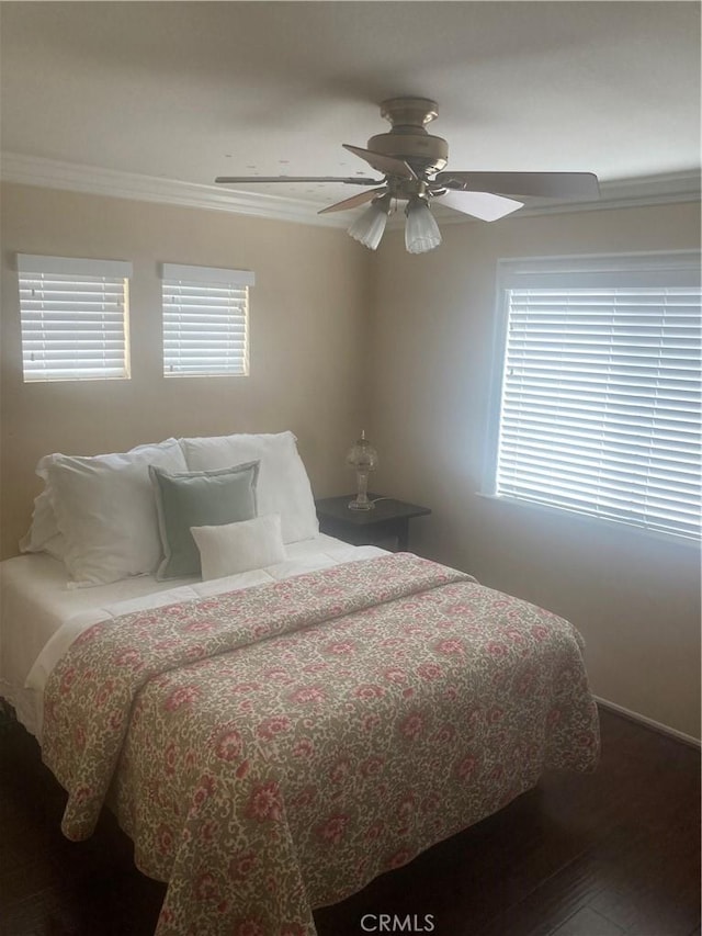32295 Via Arias, Temecula, CA 92592 - bedroom featuring crown molding, multiple windows, wood finished floors, baseboards, and ceiling fan
