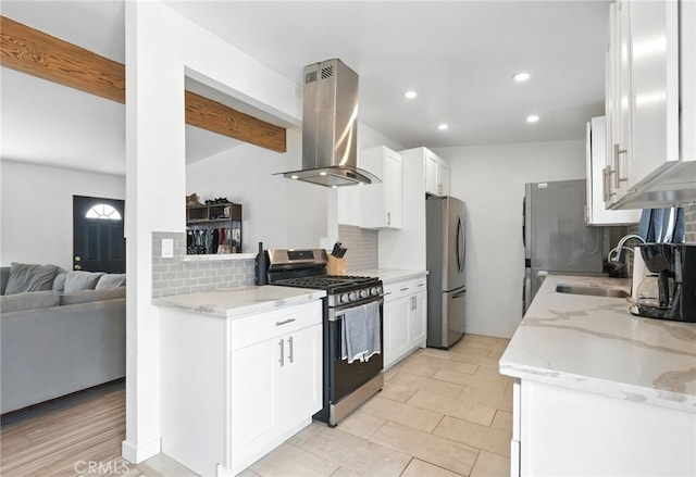 36415 Soapmine Rd, Barstow, CA 92311 - kitchen featuring stainless steel appliances, island exhaust hood, a sink, tasteful backsplash, and recessed lighting