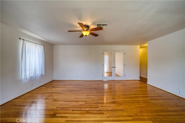 273 Almond St, San Luis Obispo, CA 93405 - spare room featuring french doors, a ceiling fan, wood finished floors, and baseboards