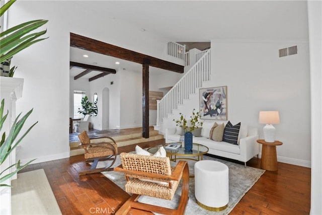112 Del Cabo, San Clemente, CA 92673 - living room with arched walkways, hardwood / wood-style flooring, stairway, baseboards, and recessed lighting
