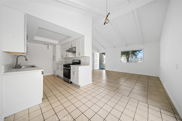 1377 Wheaton Way, Riverside, CA 92507 - kitchen featuring stainless steel gas range oven, a sink, under cabinet range hood, light tile patterned floors, and open floor plan