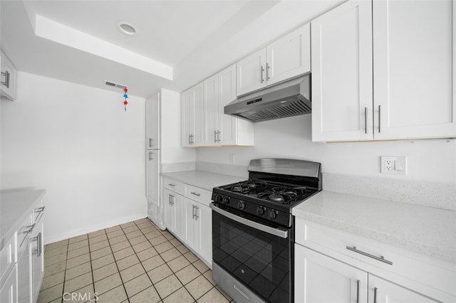 1377 Wheaton Way, Riverside, CA 92507 - kitchen featuring under cabinet range hood, stainless steel range with gas cooktop, white cabinetry, light tile patterned floors, and recessed lighting