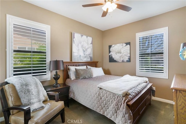 7151 Stockton Dr, Eastvale, CA 92880 - bedroom featuring dark colored carpet, baseboards, and a ceiling fan