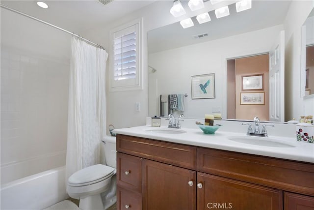 7151 Stockton Dr, Eastvale, CA 92880 - bathroom featuring double vanity, shower / tub combo with curtain, and toilet