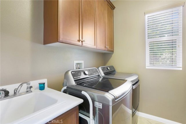 7151 Stockton Dr, Eastvale, CA 92880 - laundry room with washer and clothes dryer and cabinet space