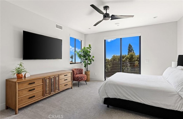 152 El Levante, San Clemente, CA 92672 - bedroom with access to exterior, light colored carpet, ceiling fan, and baseboards