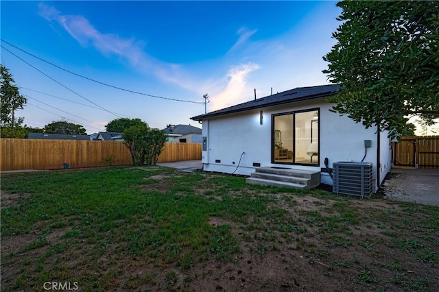 212 Oak Pl, Brea, CA 92821 - rear view of house with central AC unit, stucco siding, and entry steps