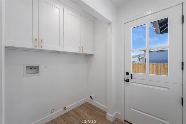 212 Oak Pl, Brea, CA 92821 - laundry area featuring baseboards, wood finished floors, washer hookup, cabinet space, and gas dryer hookup