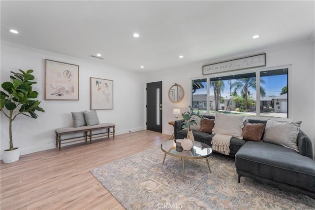212 Oak Pl, Brea, CA 92821 - living room with recessed lighting, light wood finished floors, baseboards, and crown molding
