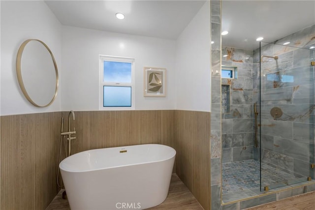 212 Oak Pl, Brea, CA 92821 - bathroom featuring a shower stall, wainscoting, a soaking tub, and tile walls
