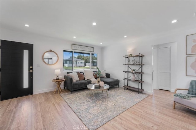 212 Oak Pl, Brea, CA 92821 - living area with wood finished floors, recessed lighting, and baseboards