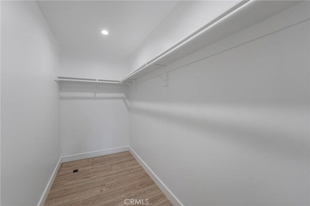 212 Oak Pl, Brea, CA 92821 - walk in closet with light wood-type flooring