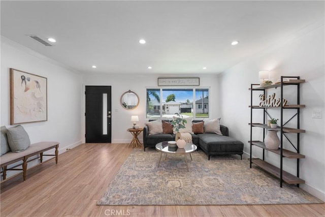 212 Oak Pl, Brea, CA 92821 - living room featuring recessed lighting, baseboards, wood finished floors, and crown molding