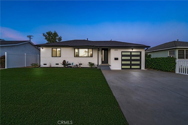 212 Oak Pl, Brea, CA 92821 - view of front of home featuring driveway, a garage, and stucco siding