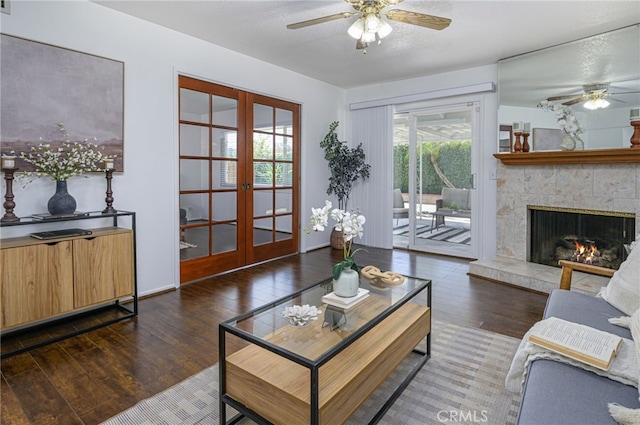 2620 W Cobblestone Rd, La Habra, CA 90631 - living room with french doors, a ceiling fan, wood finished floors, and a warm lit fireplace