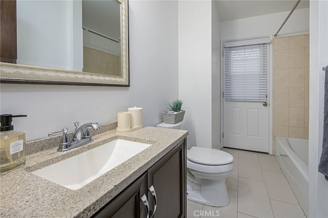 2620 W Cobblestone Rd, La Habra, CA 90631 - bathroom with toilet, tile patterned floors, vanity, and bathtub / shower combination