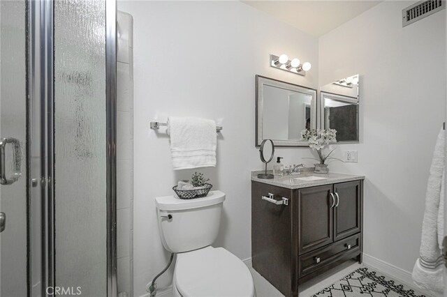 2620 W Cobblestone Rd, La Habra, CA 90631 - full bathroom featuring vanity, a stall shower, baseboards, and toilet