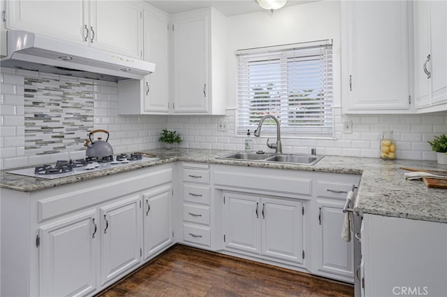 2620 W Cobblestone Rd, La Habra, CA 90631 - kitchen with under cabinet range hood, a sink, white gas stovetop, and white cabinetry