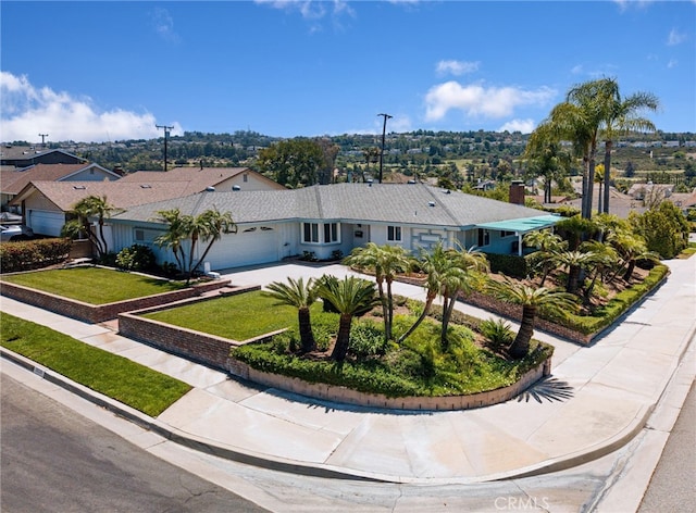 2620 W Cobblestone Rd, La Habra, CA 90631 - ranch-style house with a garage, concrete driveway, and a front yard