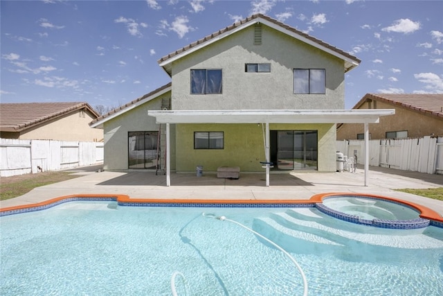 38633 Angele Trumpet Ct, Palmdale, CA 93550 - view of swimming pool featuring a patio, a fenced backyard, and a pool with connected hot tub