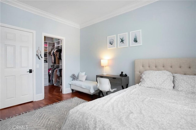 4 Sunswept Mesa, Aliso Viejo, CA 92656 - bedroom with wood finished floors, ornamental molding, a spacious closet, baseboards, and a closet