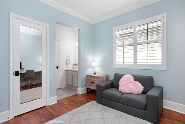 4 Sunswept Mesa, Aliso Viejo, CA 92656 - living area with crown molding, dark wood-style floors, a desk, and baseboards
