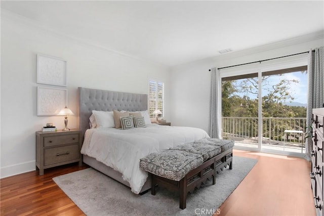 4 Sunswept Mesa, Aliso Viejo, CA 92656 - bedroom featuring access to exterior, wood finished floors, multiple windows, baseboards, and ornamental molding
