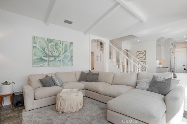 4 Sunswept Mesa, Aliso Viejo, CA 92656 - living room with arched walkways, stairway, and stone finish floors