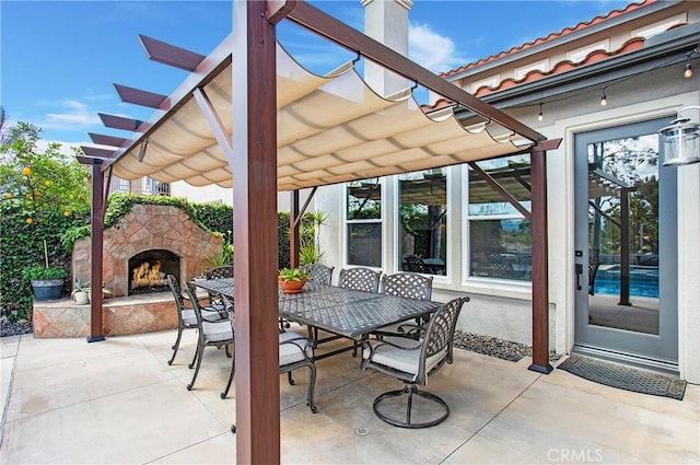 4 Sunswept Mesa, Aliso Viejo, CA 92656 - view of patio with an outdoor stone fireplace, outdoor dining area, and a pergola