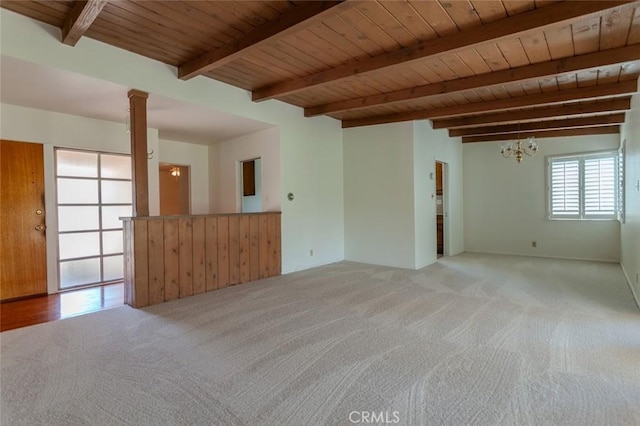 1991 Heather Dr, Monterey Park, CA 91755 - empty room featuring light colored carpet, wood ceiling with exposed beams, and a chandelier
