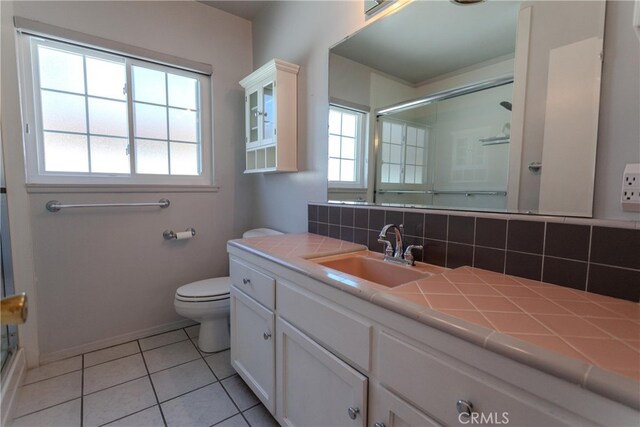 1991 Heather Dr, Monterey Park, CA 91755 - bathroom with a shower with door, plenty of natural light, toilet, and backsplash