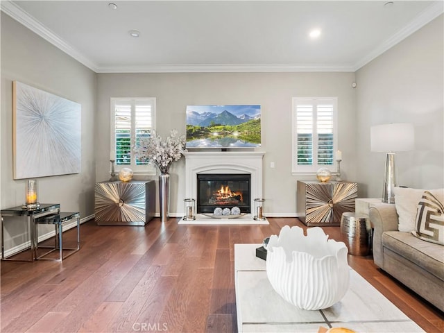 22385 Midtown Ct, Saugus, CA 91350 - living area with wood finished floors, ornamental molding, plenty of natural light, a glass covered fireplace, and recessed lighting