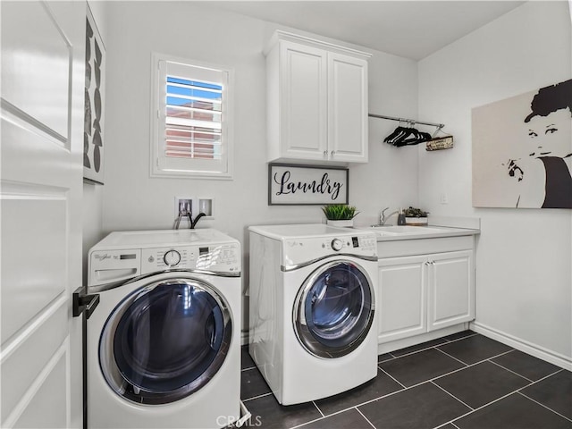 22385 Midtown Ct, Saugus, CA 91350 - laundry area featuring cabinet space, separate washer and dryer, and dark tile patterned flooring