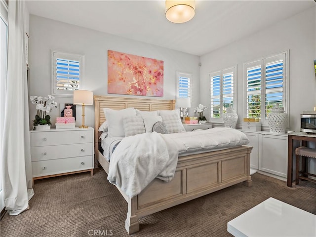 22385 Midtown Ct, Saugus, CA 91350 - bedroom with dark carpet