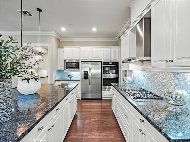 22385 Midtown Ct, Saugus, CA 91350 - kitchen featuring appliances with stainless steel finishes, crown molding, tasteful backsplash, white cabinetry, and recessed lighting