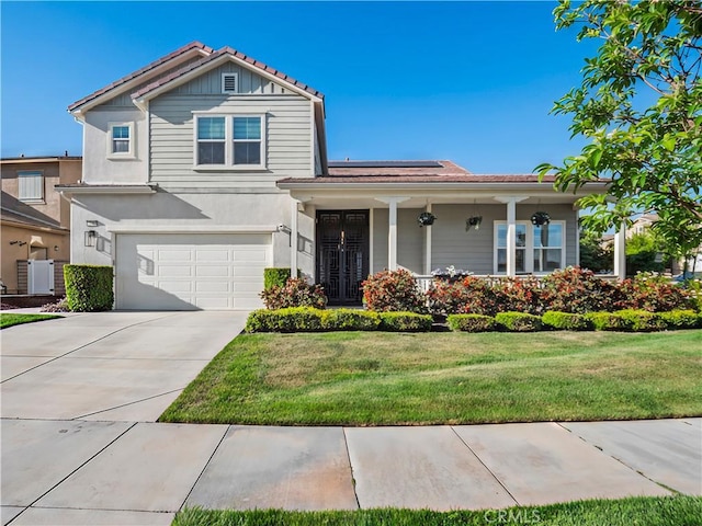 22385 Midtown Ct, Saugus, CA 91350 - view of front of property featuring a front yard, an attached garage, driveway, covered porch, and stucco siding