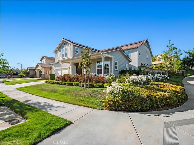 22385 Midtown Ct, Saugus, CA 91350 - view of front facade with a garage, driveway, and a front yard
