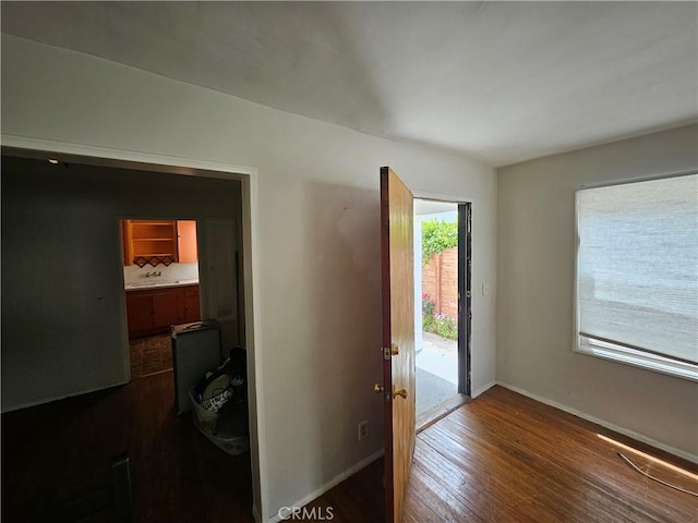 549 San Juan Ave, Venice, CA 90291 - foyer with dark wood-style flooring and baseboards