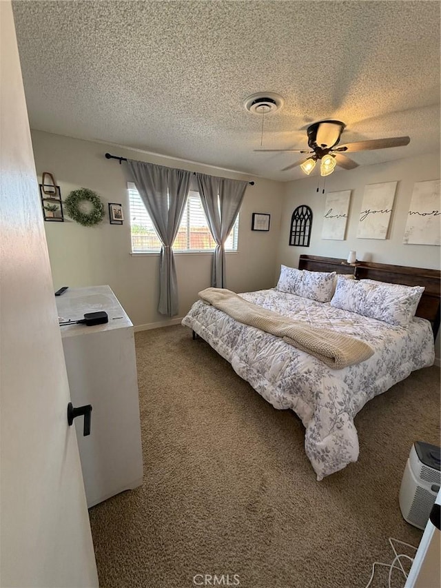 37098 San Bruno Ave, Barstow, CA 92311 - bedroom with carpet flooring, a textured ceiling, and ceiling fan