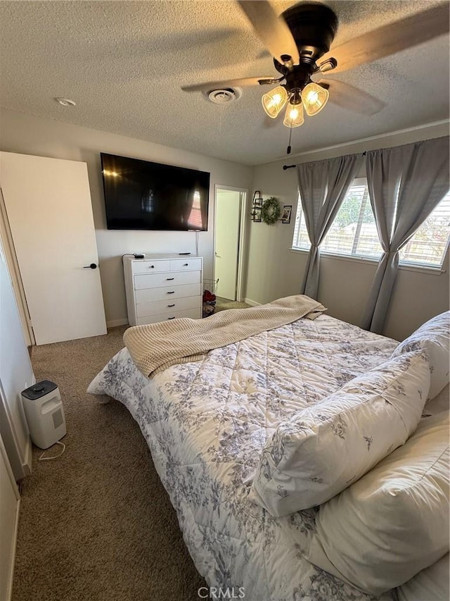 37098 San Bruno Ave, Barstow, CA 92311 - bedroom with carpet floors, a textured ceiling, and ceiling fan