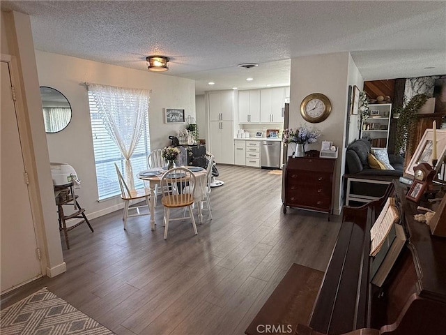 37098 San Bruno Ave, Barstow, CA 92311 - dining area with a textured ceiling and dark wood-type flooring